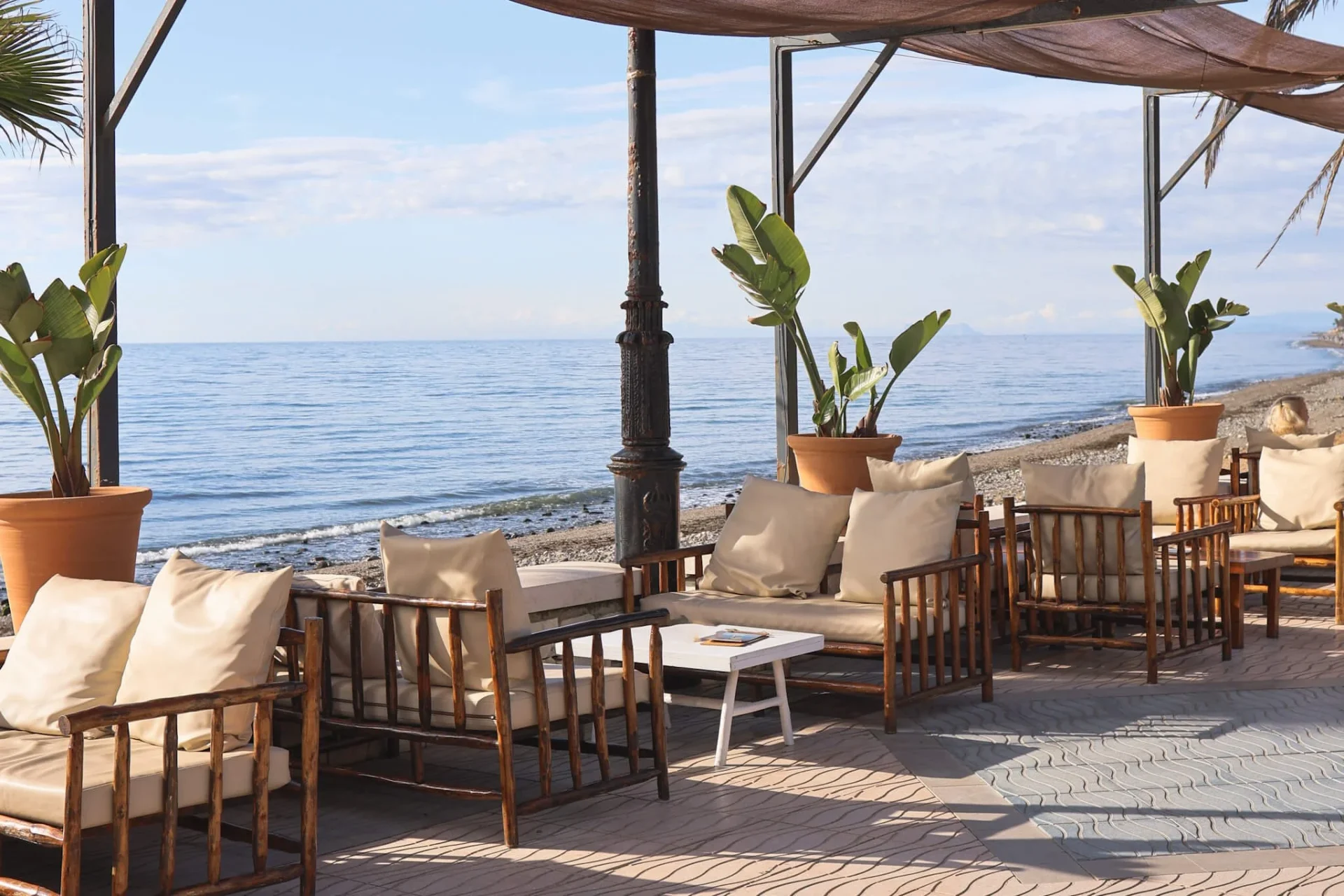 Beach club terrace with Mediterranean sea views on the San Pedro coast