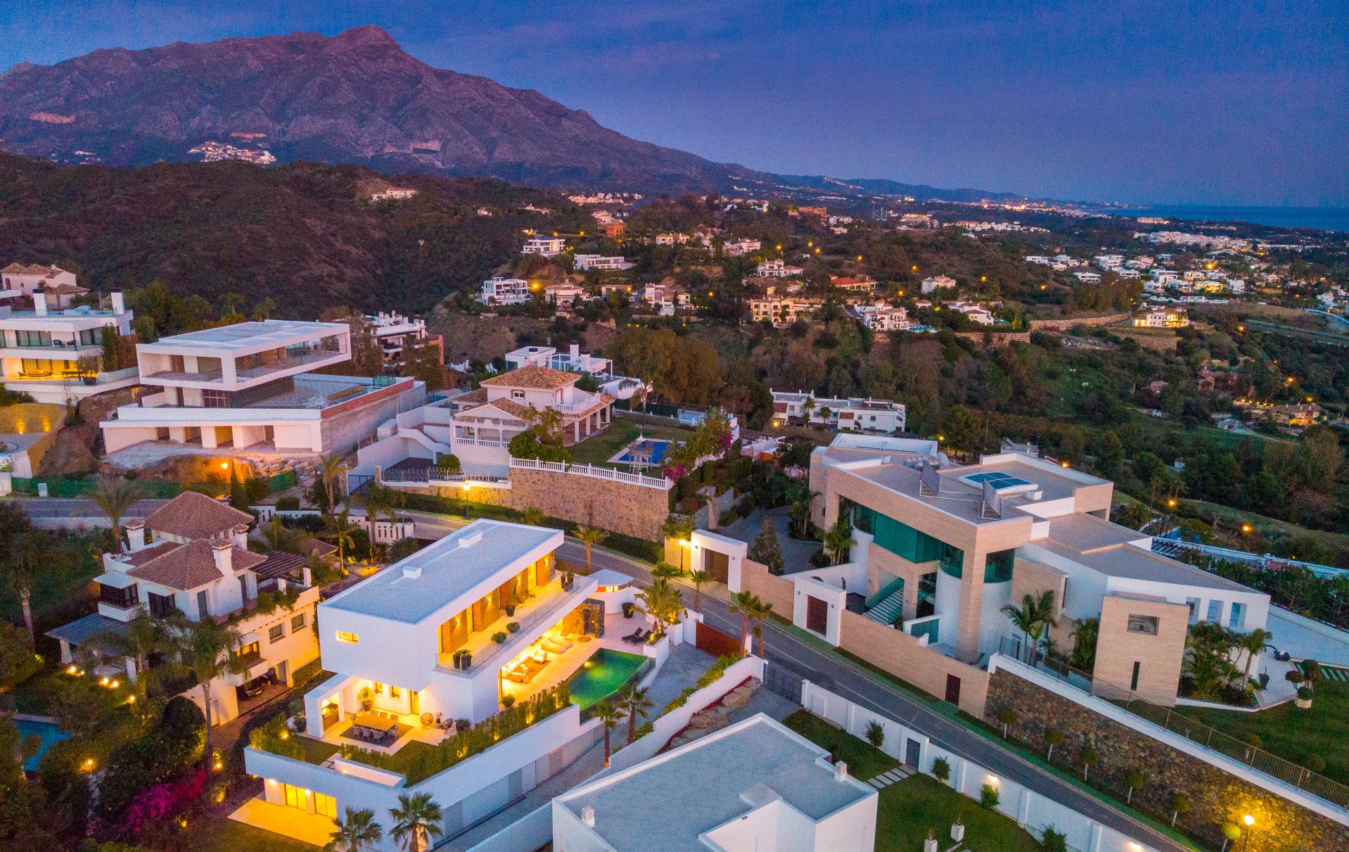 Aerial view of La Quinta villas at dusk with La Concha mountain