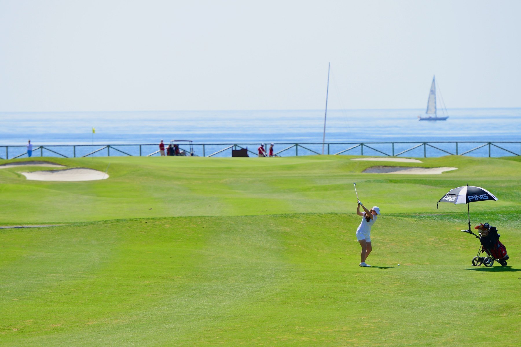Golf course at Real Club de Golf Guadalmina with the Mediterranean Sea in the background