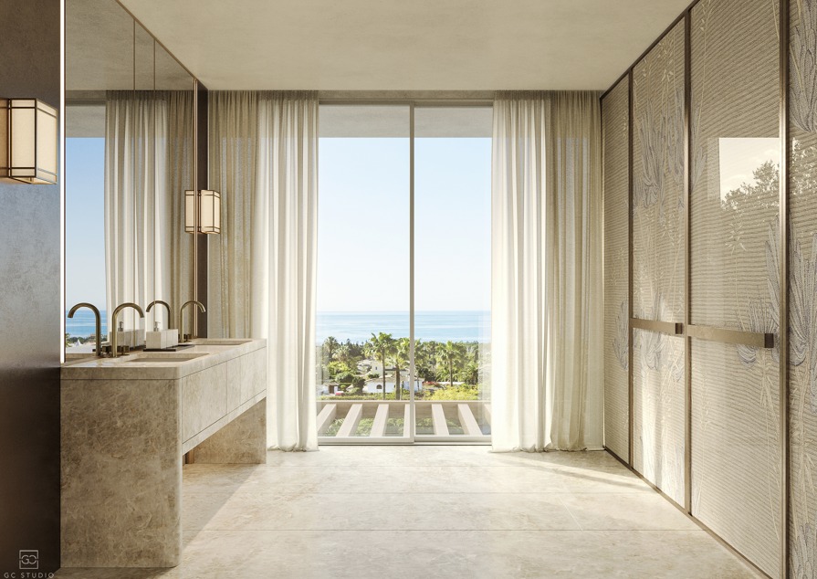Armani Residences Marbella primary bathroom with full-height windows framing Mediterranean sea views over the Golden Mile